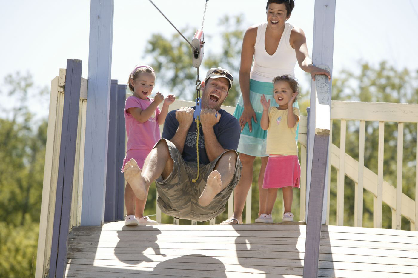 Image of a family zip lining 
