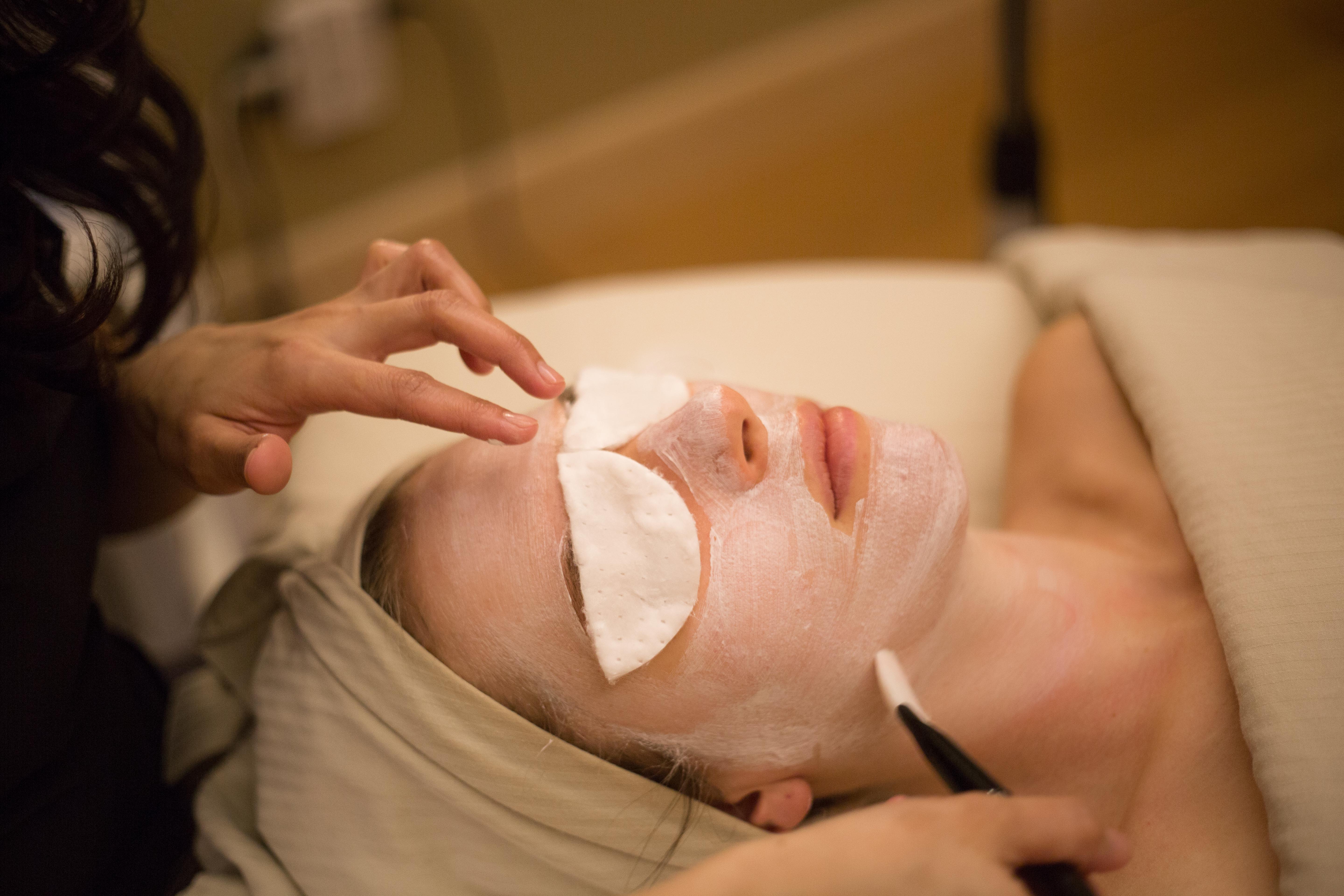 Image or a woman getting a facial