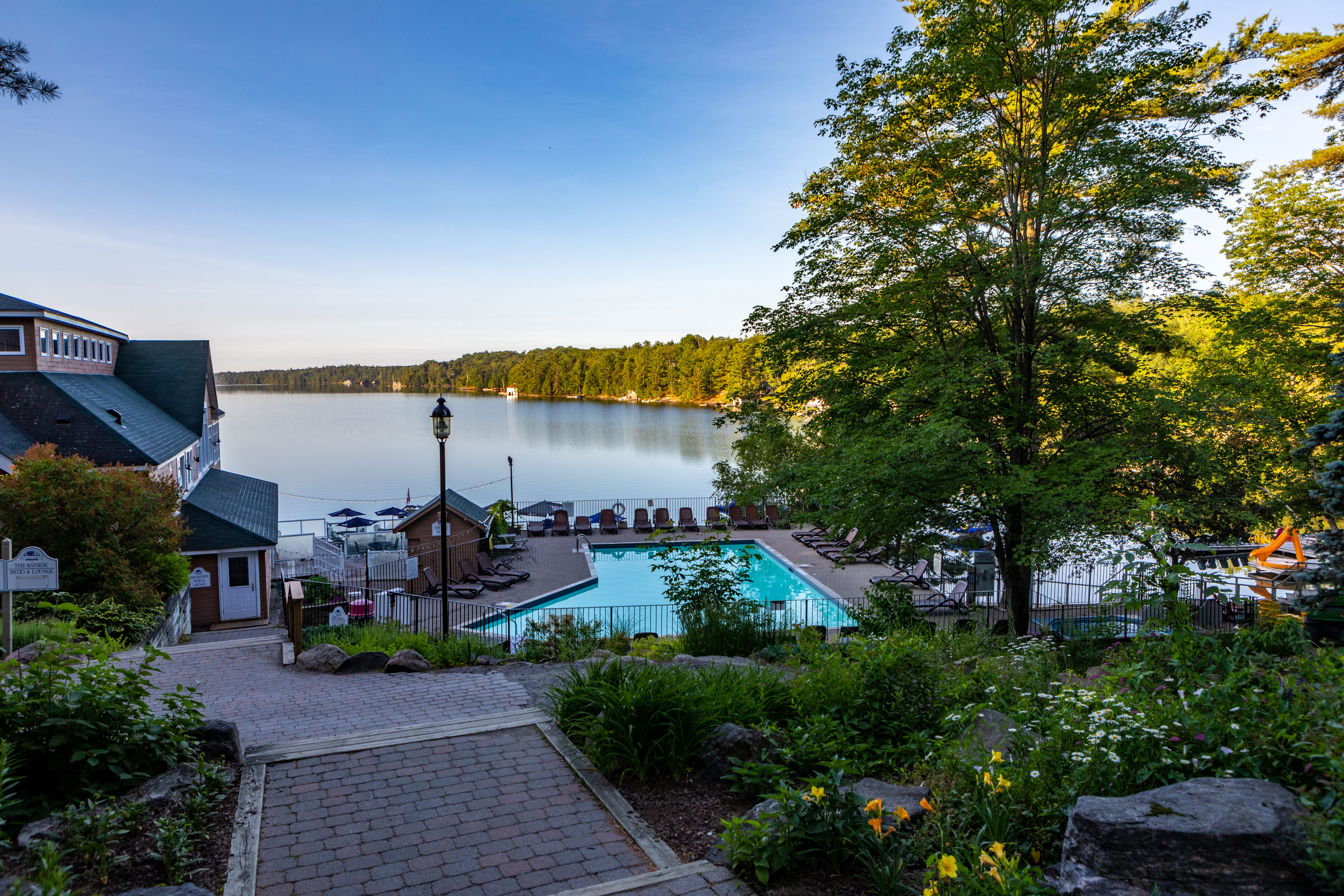 Image of Sherwood Inn overlooking the pool and lake