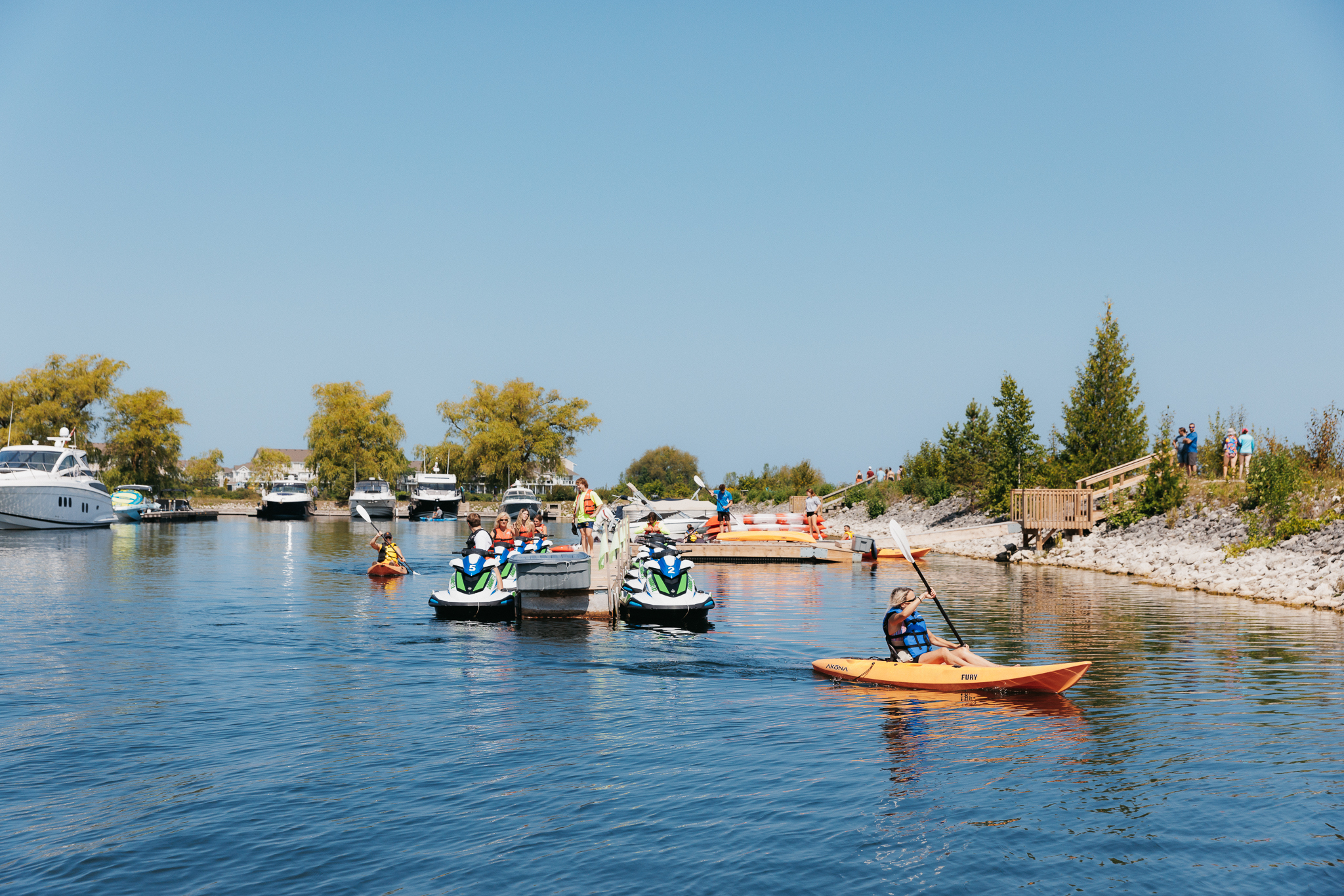 Image of family paddling at Living Water Resorts - Resorts of Ontario