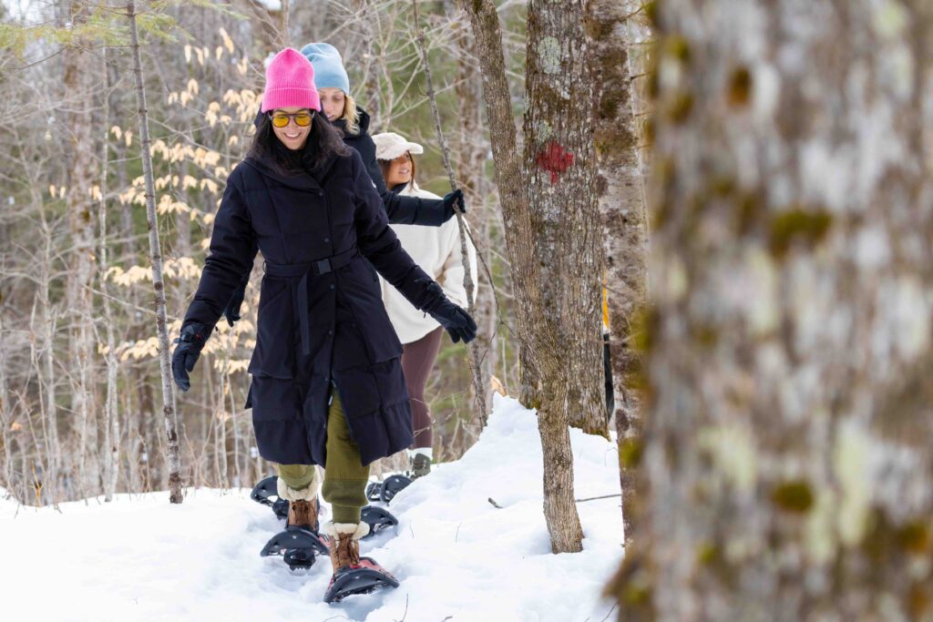 Image of ladies snowshoeing