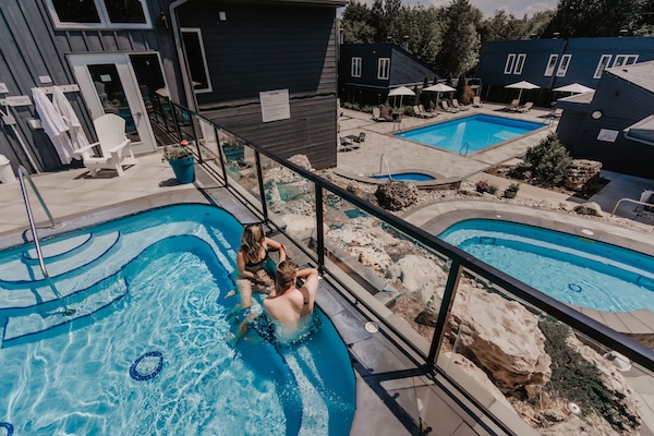 couple in the outdoor pools at Millcroft Inn & Spa - Resorts of Ontario