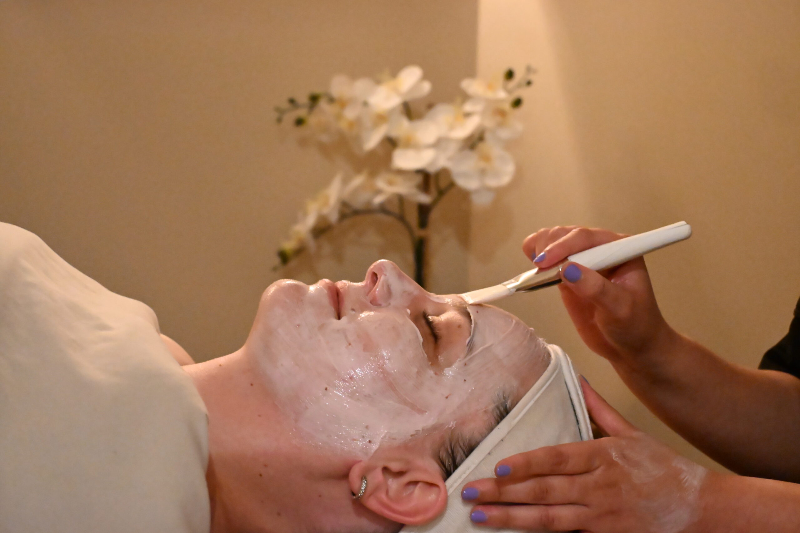 Lady getting a spa treatment at Cobble Beach Resort - Resorts of Ontario