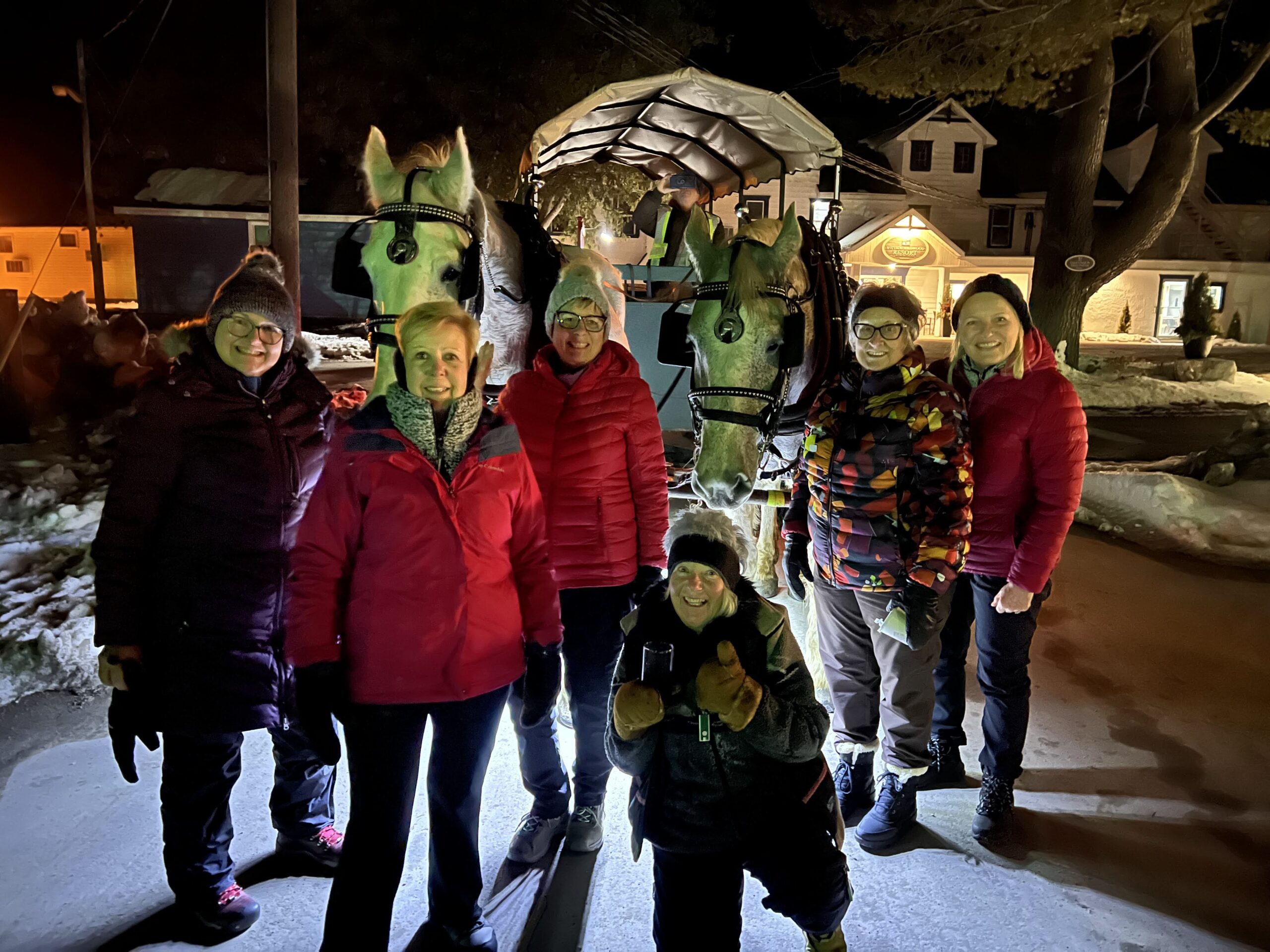 Image of a family outside the front of the main lobby at Bayview Wildwood Resort - Resorts of Ontario