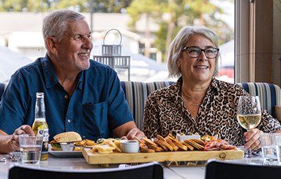 Image of a couple having dinner at Living Water Resort - Resorts of Ontario