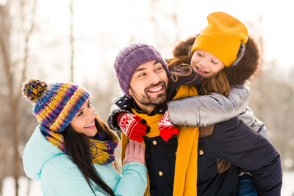 Image of a family outside at Fern Resort - Resorts of Ontario