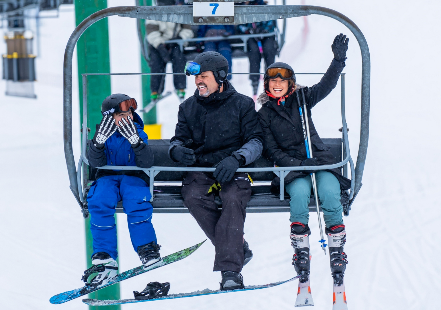 Image of a family going up the chair lift at Hockley Valley Resort - Resorts of Ontario