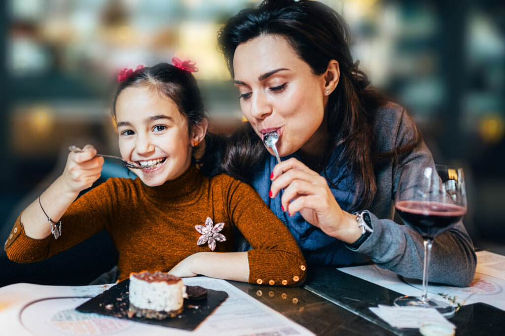 Image of a mother and daughter eating desert at Nottawasaga Resort - Resorts of Ontario